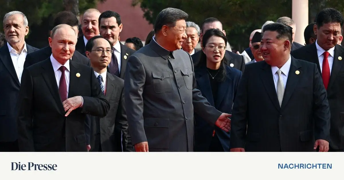 Xi-Jinping-feiert-mit-Kim-und-Putin-Milit-rparade-in-Peking-Trump-w-tet