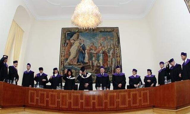 Members of Austria's constitutional court (Verfassungsgerichtshof) pose during a photo opportunity in Vienna