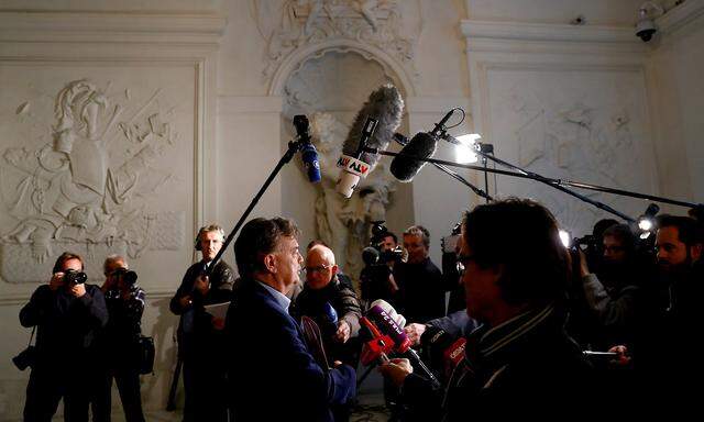 Head of Greens Kogler arrives for a meeting in Vienna