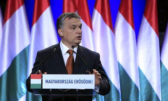 Hungarian Prime Minister Orban gestures during his annual state-of-the-nation speech in Budapest