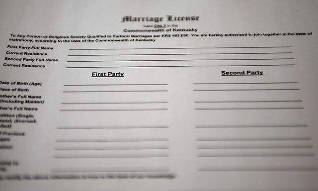 A copy of a new marriage certificate application for same-sex couples issued to Kentucky county clerkk is seen in Toronto