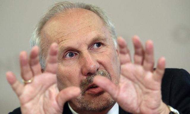 European Central bank policymaker and head of the Austrian National Bank Nowotny addresses a news conference in Vienna