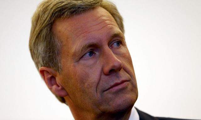 Former German President Christian Wulff awaits the start of his trial at the regional court in Hanover