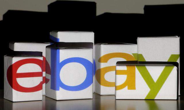 An eBay logo is projected onto white boxes in this illustration picture taken in Warsaw