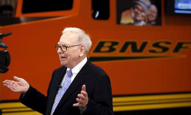 File photo of Berkshire Hathaway Chairman Warren Buffett talking in front of a mock BNSF railroad engine at the Berkshire Hathaway annual meeting