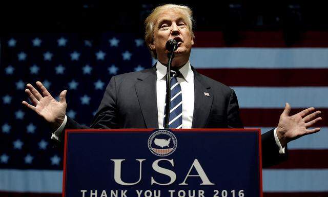 U.S. President-elect Donald Trump speaks at a 'Thank You USA' tour rally in Grand Rapids