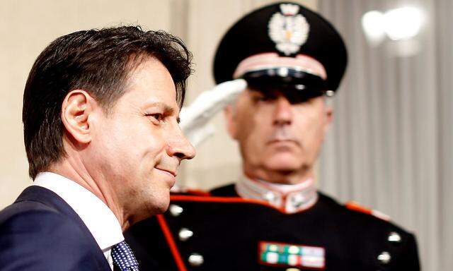 Newly appointed Italy Prime Minister Giuseppe Conte arrives to speaks with media after the consultation with the Italian President Sergio Mattarella at the Quirinal Palace in Rome