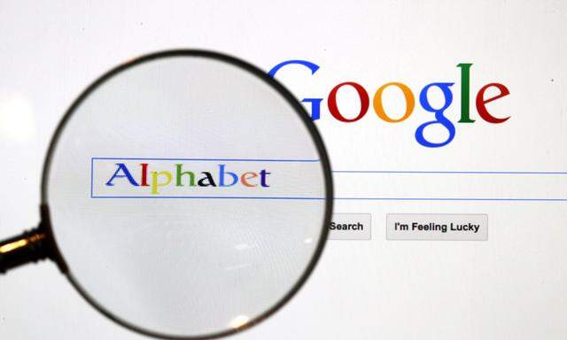 A Google search page is seen through a magnifying glass in this file photo illustration taken in Berlin