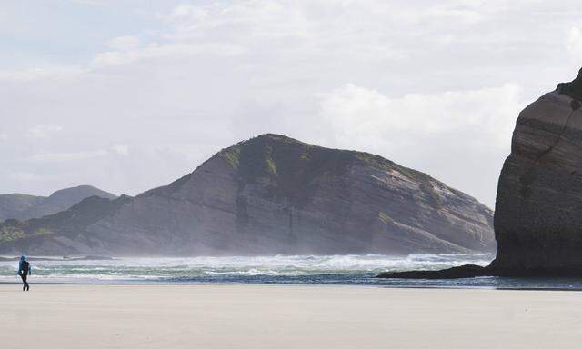 Unterwegs am Wharariki Beach, Golden Bay, South Island, Neuseeland.