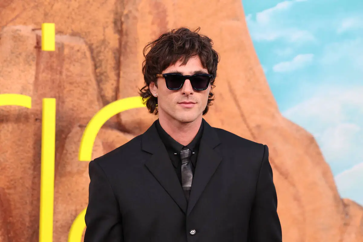 Jacob Elordi with stud earrings.