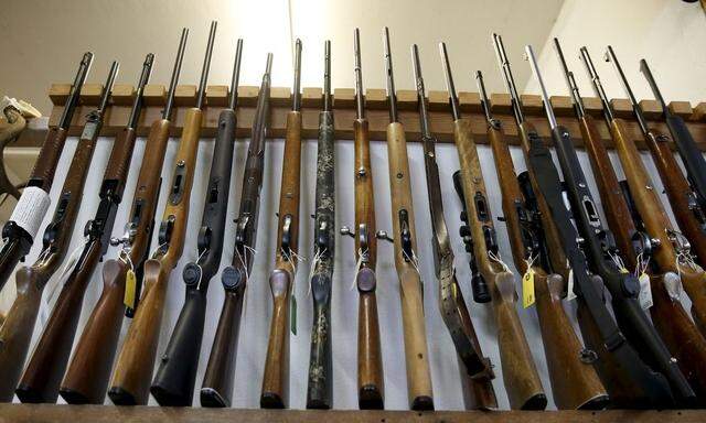 Guns for sale are displayed in Roseburg Gun Shop in Roseburg