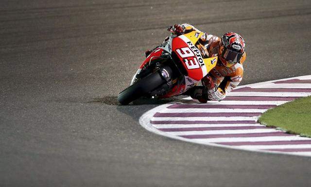 Honda MotoGP rider Marquez of Spain races during a free practice session at the MotoGP World Championship at the Losail International circuit in Doha