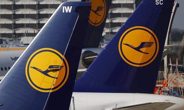 File picture shows planes of the Lufthansa airline standing on the tarmac in Frankfurt airport