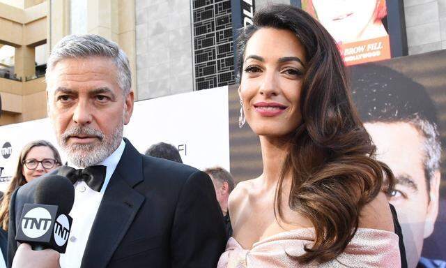 George Clooney mit Ehefrau Amal. 