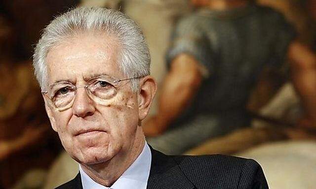 Italian Prime Minister Mario Monti attends a joint news conference with Dutch Prime Minister Mark Rut