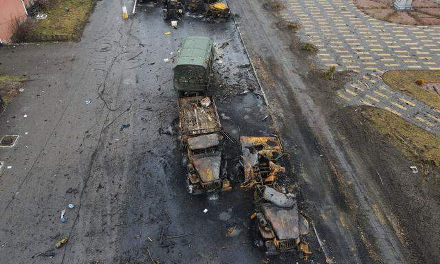 Destroyed Russian military vehicles are seen on a street in Borodyanka