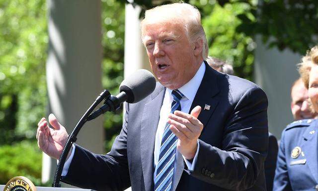 U S President Donald Trump speaks as he awards the Commander In Chief Trophy to the U S Air Force