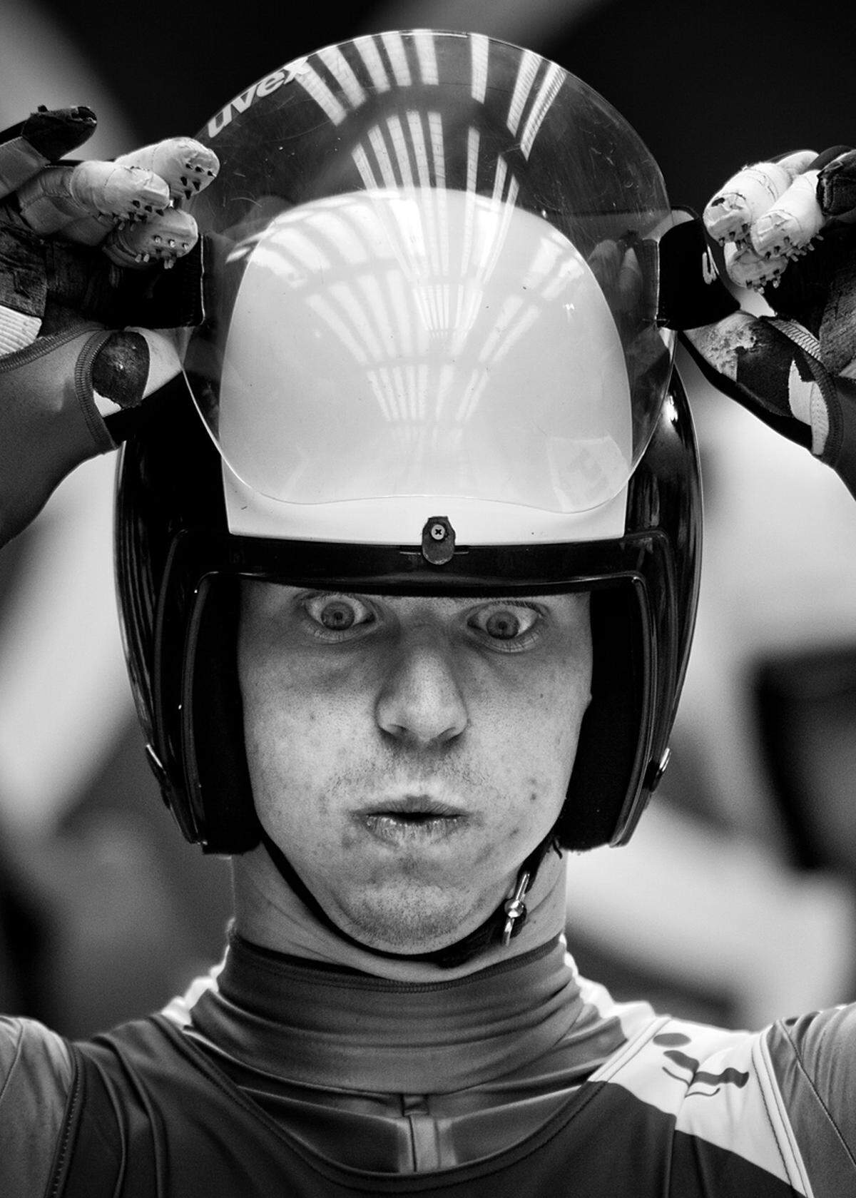 Sascha Fromm, Deutschland: "Olympische Gesichter 1".Der italienische Rennrodler Ludwig Rieder bereitet sich auf einen Trainingslauf bei den Olympischen Spielen in Sotschi vor. 