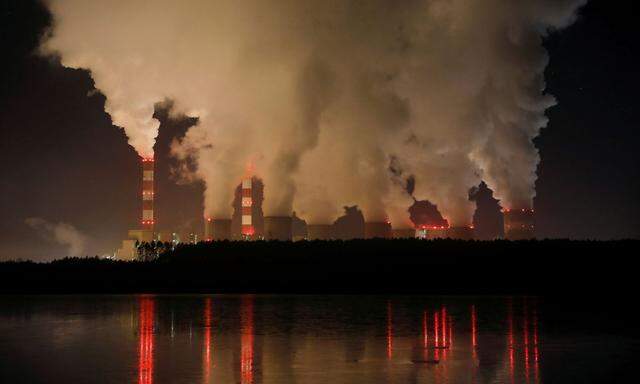 FILE PHOTO: Smoke and steam billows from Belchatow Power Station