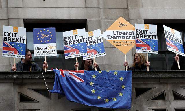 A number of pro-EU supporters protest outside the building where Britain's Foreign Secretary Boris Johnson delivers a speech on Brexit at the Policy Exchange in central London