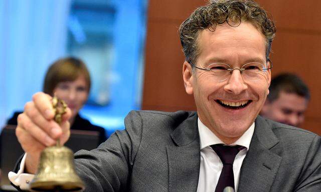 Eurogroup President Dijsselbloem rings the bell as he chairs an euro zone meeting in Brussels