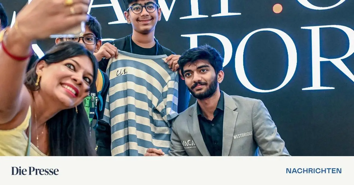 Schach-Weltmeister-Gukesh-im-langen-Schatten-von-K-nig-Magnus-Carlsen-premium-