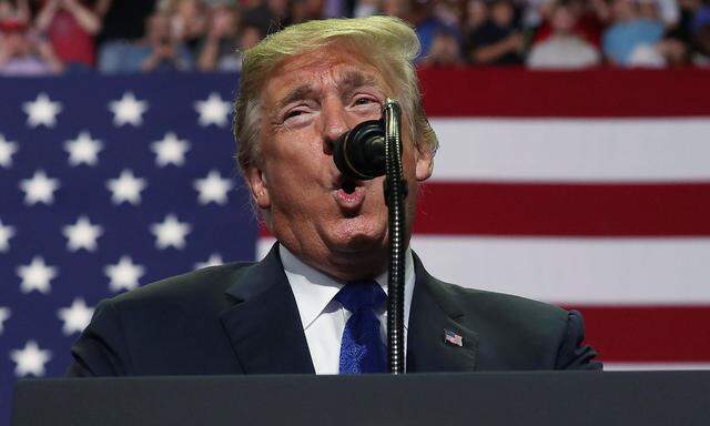 President Donald Trump addresses supporters during a Make America Great Again rally in Southaven Mississippi