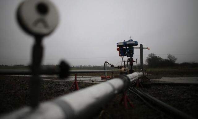 An employee of European Gas Limited works on British company's coalbed methane exploration site outside Folschviller