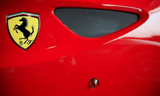 FILE PHOTO: The Ferrari logo on a car at a dealership in Singapore