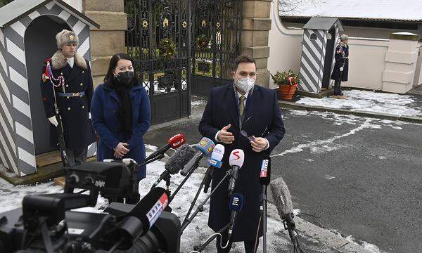 Candidate for Czech Foreign Affairs Minister Jan Lipavsky (Pirates), right, speaks to journalists outside Lany Chateau