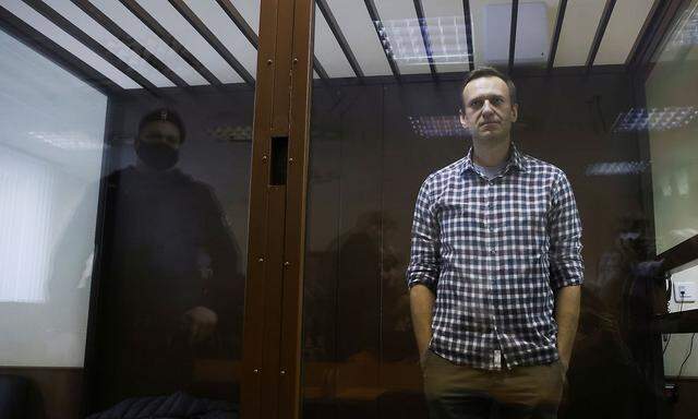 FILE PHOTO: Russian opposition politician Alexei Navalny attends a court hearing earlier court decision to change his suspended sentence to a real prison term