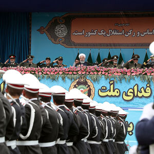 Iranian President Hassan Rouhani watches the National Army Day ceremony parade in Tehran