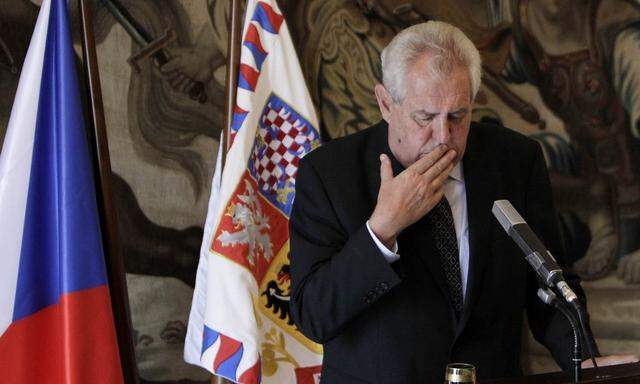 Czech President Zeman reacts as he answers questions from media during a news conference in Prague