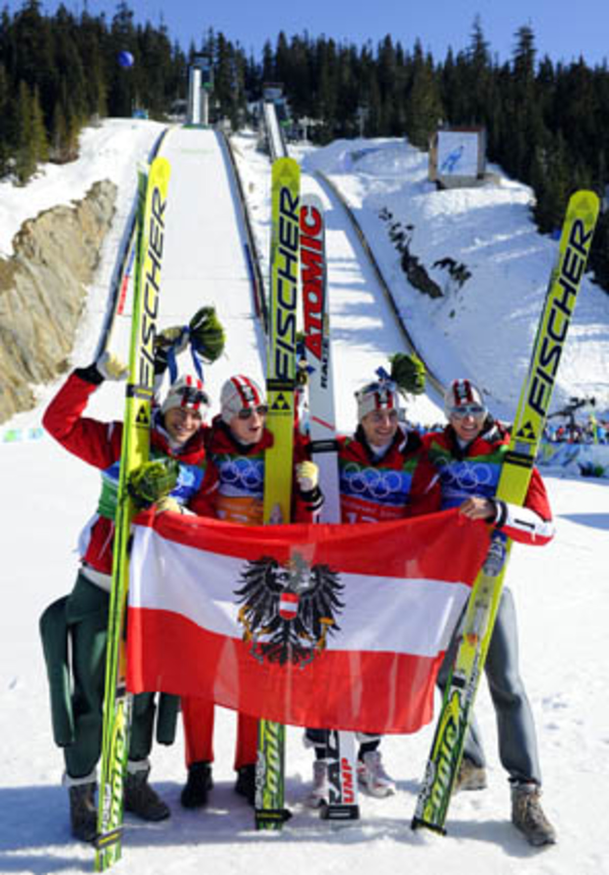 Im Teambewerb landet endlich das ersehnte Olympia-Gold in den Händen des Tirolers: Gemeinsam mit seinen Kollegen Andreas Kofler, Wolfgang Loitzl und Thomas Morgenstern deklassiert er die Konkurrenz: Österreich gewinnt über 70 Punkte vor Deutschland, Schlierenzauer schafft in seinem zweiten Sprung die Tageshöchstweite von 146,5 Metern.