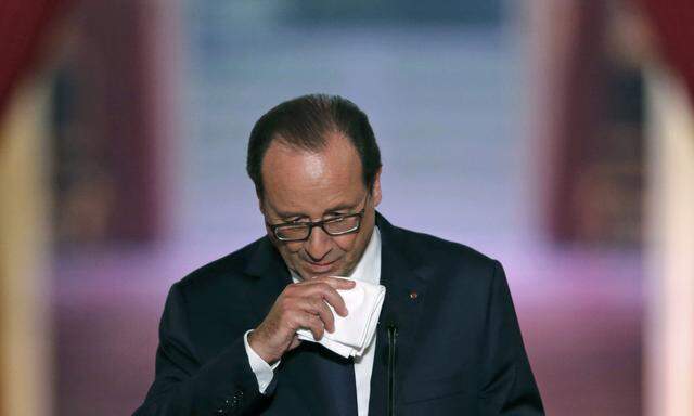 French President Francois Hollande addresses a news conference at the Elysee Palace in Paris