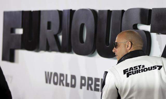 Cast member Diesel poses at fans at the premiere of ´Furious 7´ at the TCL Chinese theatre in Hollywood