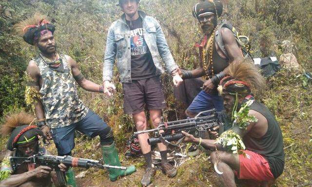 Rebels in Indonesia´s Papua say images show abducted New Zealand pilot in good health