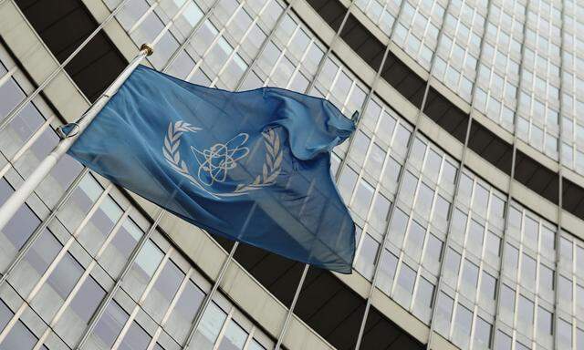 The flag of the International Atomic Energy Agency IAEA flies in front of its headquarters in Vienna