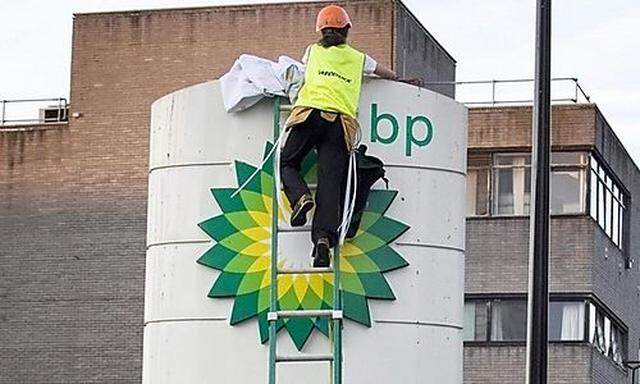 Greenpeace activists shut down the Hampstead Road BP station in London