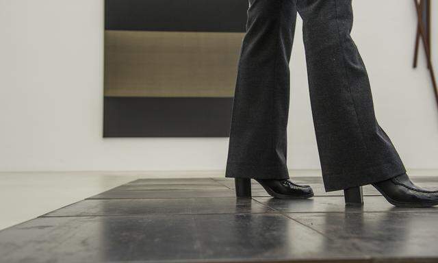 Bodenplatten von Carl Andre bei einer Ausstellung