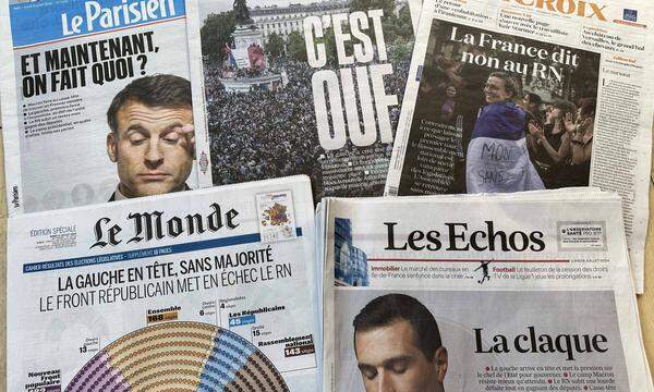 Die Titelseiten französischer Printmedien nach dem Wahlausgang am Sonntagabend.